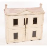 A Victorian doll's house, the four rooms enclosed by a pair of doors with glazed windows,
