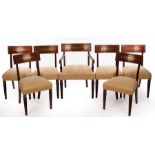 Six Regency mahogany dining chairs, the cresting rails inlaid brass scrolls etc.