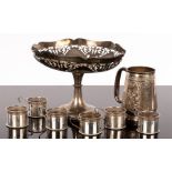 A silver comport, Walker and Hall, Sheffield 1913, with pierced border on a pedestal base,