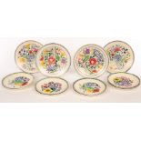 Poole Pottery, four floral shallow serving bowls, 26.