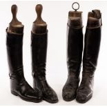 A pair of leather riding boots and trees, by Jackson of London, approximately size 5,