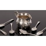 A set six George III silver teaspoons, IL, London 1788, initialled and a Victorian silver cream jug,