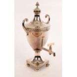 A silver plated tea urn of Neoclassical design, with ivory tap handle,