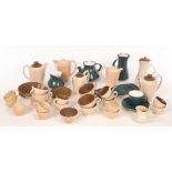 Poole Pottery, a quantity of mushroom and sepia twintone tea and coffee wear,