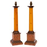 A pair of Grand Tour style table lights with simulated wooden columns and bases,