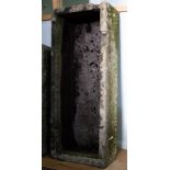 A large rectangular stone trough,