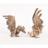 A pair of plated fighting cock table ornaments, 20.