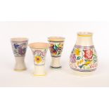 Poole Pottery, four floral vases, the largest 24cm high,