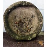 A circular stone trough,