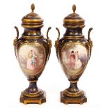 A pair of French gilt metal mounted vases,