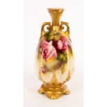 A Royal Worcester twin-handled vase, decorated roses and signed M Hunt (Mildred Hunt), on four feet,