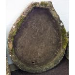 A pear-shaped stone trough,