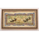 A late 19th Century Persian miniature of a deer hunt, painted on ivory and within a floral reserve,