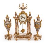 A French clock garniture of veined marble, comprising a portico clock,