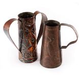 Style of Newlyn, an Arts & Crafts copper jug of tapering form, embossed penguins,