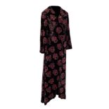 A Ronit Zilkha long crushed black velvet coat with floral pattern and matching skirt,