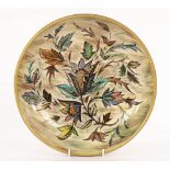 Glyn Colledge (1922-2000), a large pottery bowl with floral decoration to a green and grey ground,