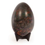 Hans Hedberg (1917-2007)/a ceramic egg, mottled amber and green glaze, signed and bearing SF seal,