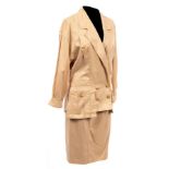 A Chanel Boutique lightweight beige safari skirt suit with Chanel wheat sheaf buttons and a