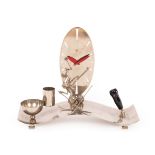 Hagenauer, a silvered metal desk set, undulating tray base with oval clock,