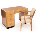 Style of Heal & Son, a limed oak desk and chair, the desk 106cm wide, 60cm deep, 75cm high,