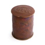 Newlyn, a lined copper cylindrical jar and cover, Tea embossed to lid, decorated stylised fish,