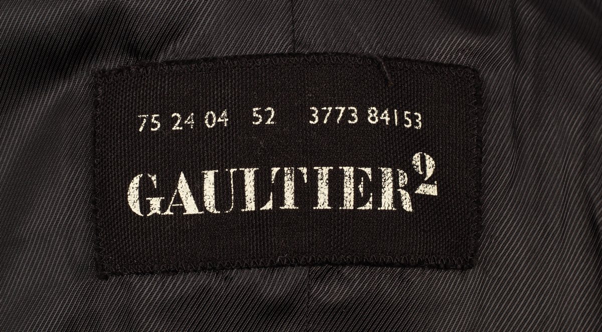 A Gaultier2 black sleeveless double breasted trench style jacket with bondage straps and belts, - Image 2 of 2