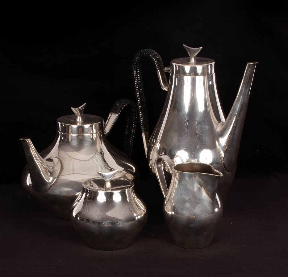 Attributed to Eric Clements, circa 1960, a four-piece silver plated tea service of modernist design,