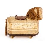A 20th Century ride-on toy horse, possibly Scandinavian, with carved head and painted sides,