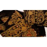 Three Art Deco embroidered black net panels in the Egyptian Revival style,