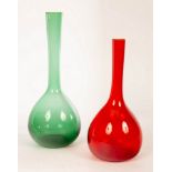 Two blown coloured glass bottles, of retro design, green 33cm high, red 27.