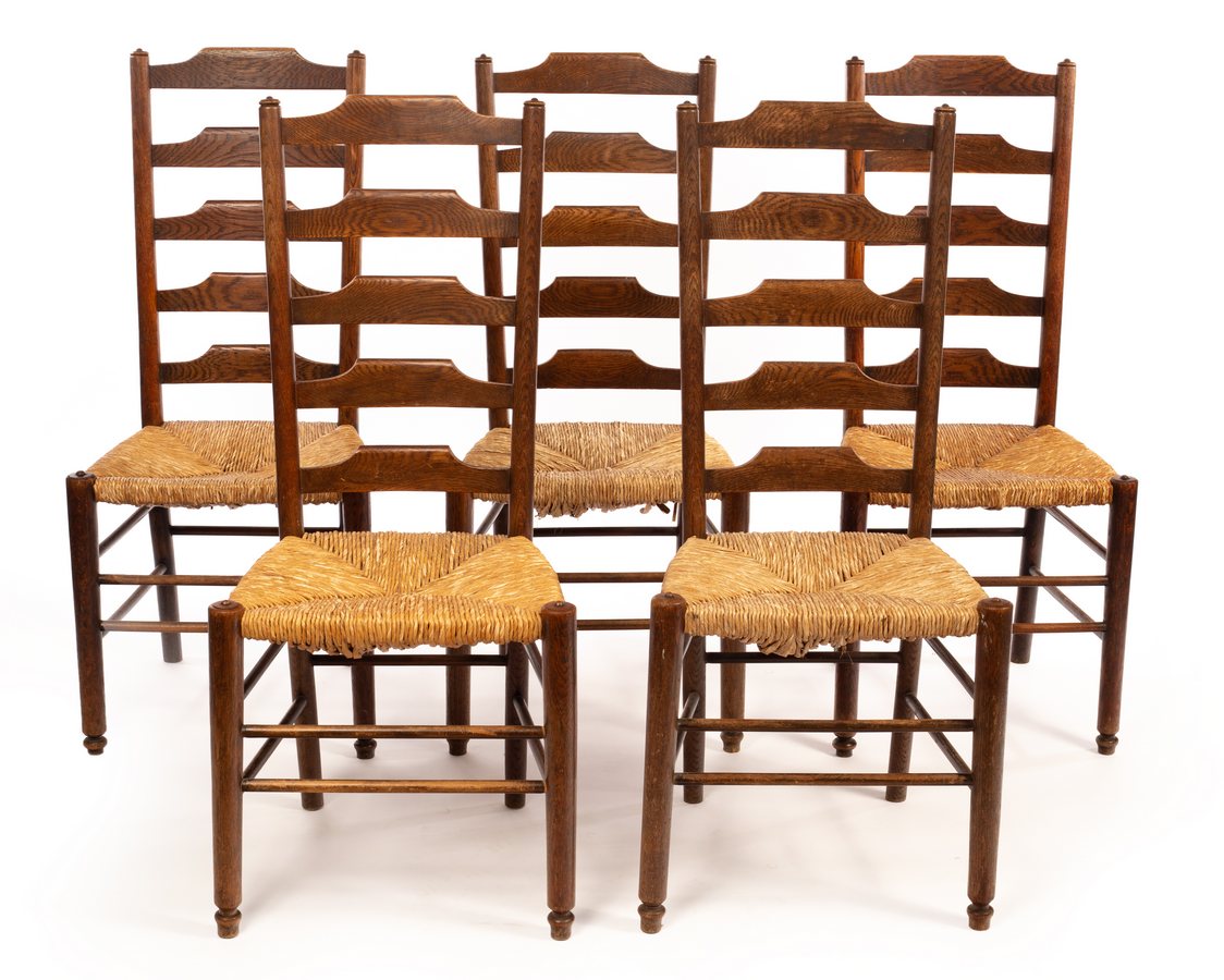 Manner of Philip Clissett (1817-1913) for Heals, a set of five oak dining chairs, with raffia seats,