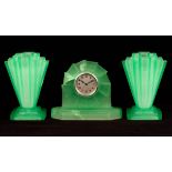 A group of 1930s pressed lime green glass,