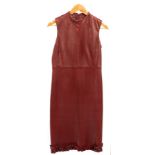 A Bally leather form fitting sleeveless dress with ruffle hem, fully lined,