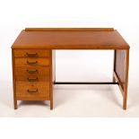 Lebetkin Products Ltd, a light oak desk, 1950s, fitted four shallow drawers above a deep drawer,