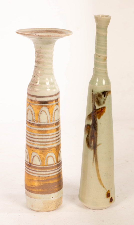Mary Rich (born 1940), a slender vase with spirally moulded neck, gold arch designs to body,