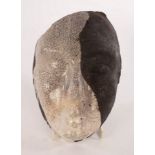 Lucy Rockliffe, a raku fired wall mask, impressed mark, 20cm high and two ceramic wall plaques,