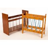 A mid-Century teak magazine rack, 51cm wide and a beech pegged rack with string sides,