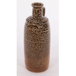 John Maltby (1936-2020), a stoneware flagon of dimpled form with oval plaque inscribed WINE,