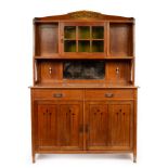 Manner of Shapland & Petter, an Arts and Crafts style dresser,