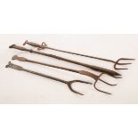 Three Arts & Crafts steel toasting forks,