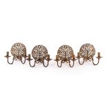 A set of four Arts & Crafts style brass wall lights, in the manner of the Cotswold School,