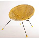 A child's Sputnik or Satellite chair, in yellow and white,