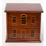 A small two drawer chest in the form of a house,