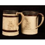 Two English white stoneware tankards decorated hunting scenes, trees etc.
