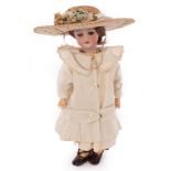 A German DEP bisque head doll, with sleepy eyes and open mouth, having composition body,
