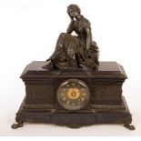 A 19th Century black slate clock with a bronze figure finial, 44.