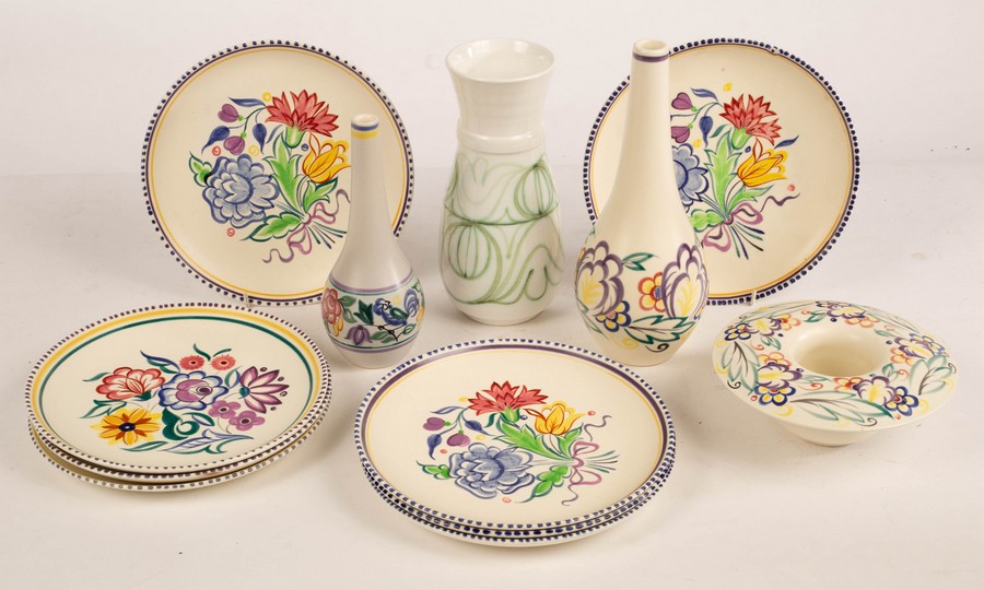 Poole Pottery, eight floral dinner plates, 23cm diameter, a large floral posy dish, 18.