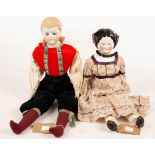 A French porcelain head doll and a bisque head doll,