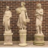 Three compositon stone figures of classically draped women, on plinths,